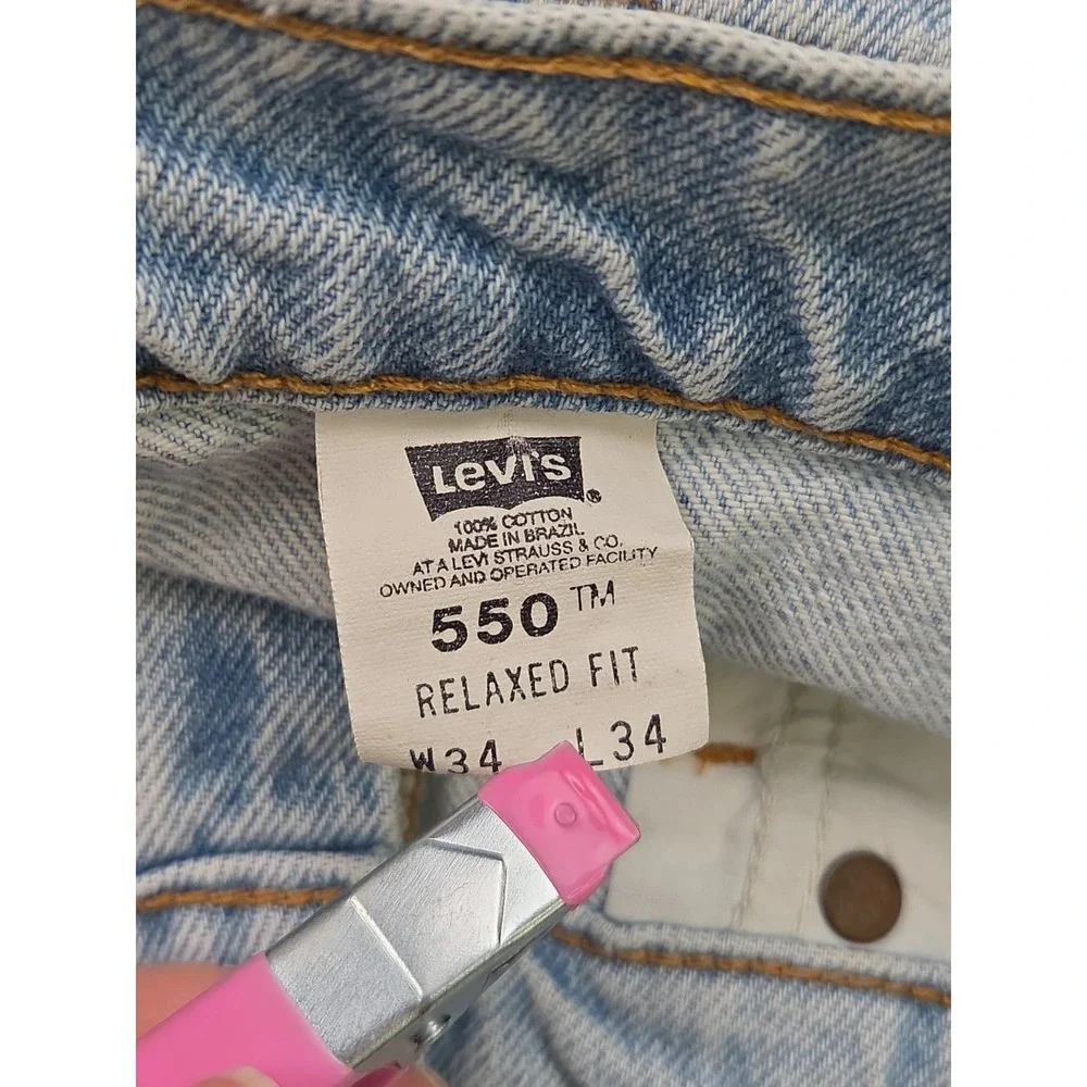 Vintage 90s Levi's 550 Jeans | Orange Tab‎ Light Wash | Relaxed Tapered | 34x34